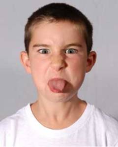 Not my kid, but pretty good tongue-sticker-outer